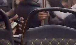 Otobüste yumruk yumruğa kavga kamerada