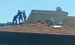 Bina çatısında yürekleri ağza getiren kavga